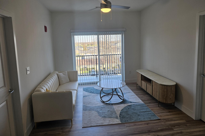 Living Room - Oasis Apartment