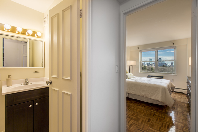 Bedroom and bathroom - Dexter Park Apartments