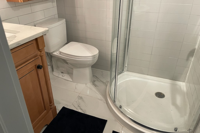 Shared Bathroom - (FOR MALES) Private rooms for rent in a shared basement at Keele St House