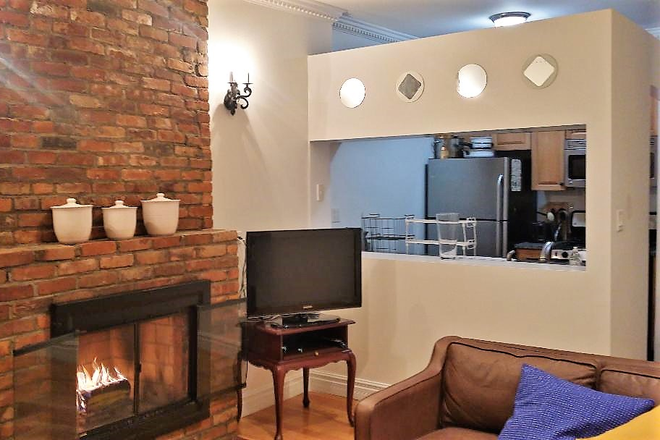 Fireplace and Kitchen - Furnished rooms-400 W 147 St-New York City Townhome