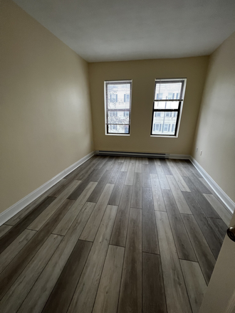 Visit hubrealtyproperties.com - Brilliant 3 bedroom with living room, lots of light, handy to the T and campus Apartments