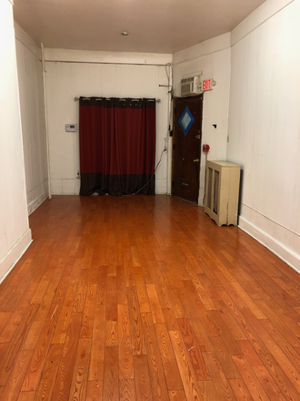 living - 615 S 52nd Street, 1st floor, large 2 bedroom apartment.