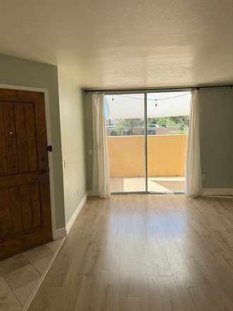 Entrance to unit on left, view to unit's outdoor private patio - $2375 - Condo in The Venetian - 1 br + 1 bath + 2 parking spots; Just Minutes from La Jolla & UCSD!