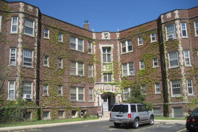 Outside View of the Building - The Varsity - 1 Block from Campus Apartments
