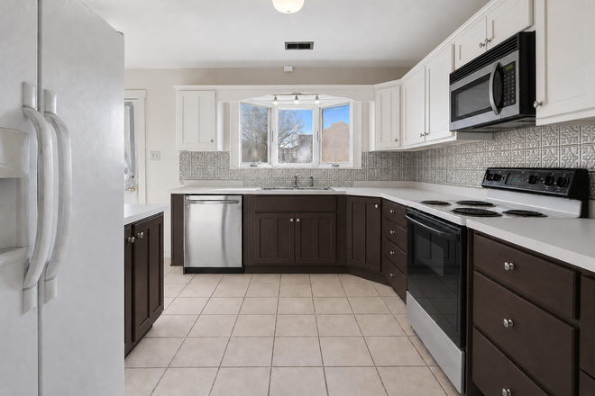 Kitchen - 3 BR, 1 bath house with 2 car garage, 1 block from campus, washer/dryer/dishwasher, fenced backyard,