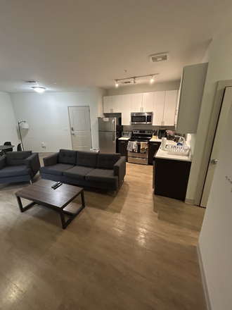 Right side of living room from bedroom - Landmark Apartment