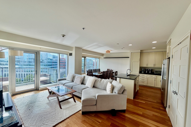 Living room with view of the basin - Sunny 2 BR/2 BA condo, Unit 813, at Waterplace Condominiums. Walking distance to Brown Campus