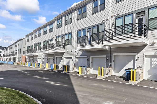 Back of the building - Brand New 3BDs, 2.5BAs Townhouse Walk to Train Station