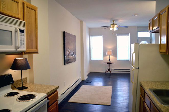 Kitchen opens to full Living room - Spacious, Completely Renovated 3-4 Bdr Townhouse