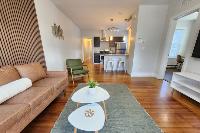 Living Room/Kitchen - Furnished 2 Bedroom with Office! All Utilities Included & WIFI! Apartments