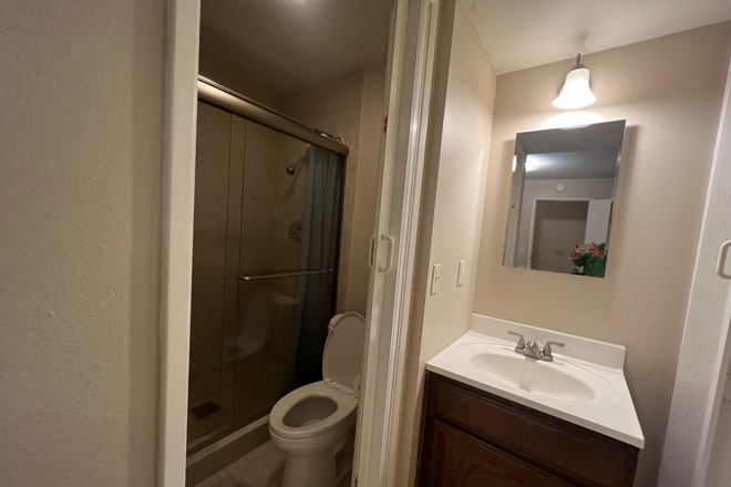 Own bathroom in your room with free monthly cleaning - Fully furnished Private Room w/ Own bathroom and Garage Parking laundry All Utilities Included Townhome