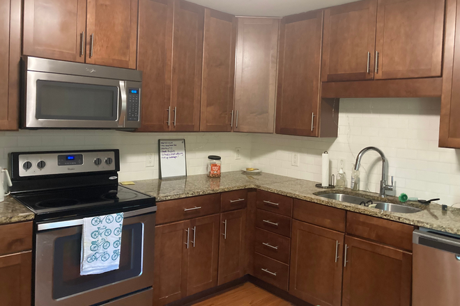 Big kitchen, lots of storage - 1/2 Block from East Campus 2 bedroom apartment to share