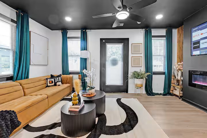 Living Room - Kayla's Hideaway (Fully Furnished with washer & dryer in unit w/ free street parking) Duplex