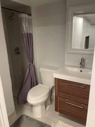 Bathroom - Modern / Semi-furnished and laundry included  1 Bedroom Apartment