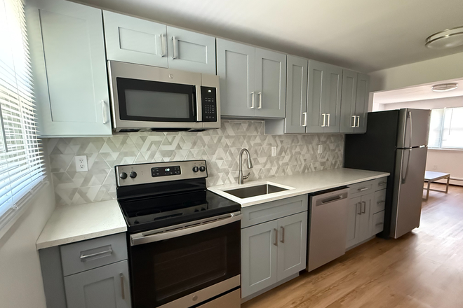 Kitchen near back door - The Den Hunting Lodge