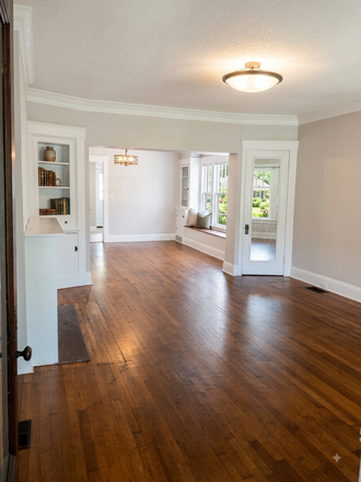 Living room looking into the dining room - Renovated 3BR/2BA duplex near CWRU and University Circle Duplex