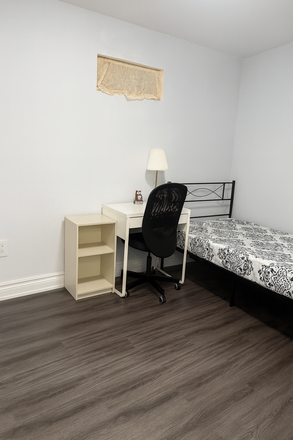 Bedroom B: $930 with Single sized bed - Private rooms in a shared basement at Cindy Nicholas Dr, Utilities included! House