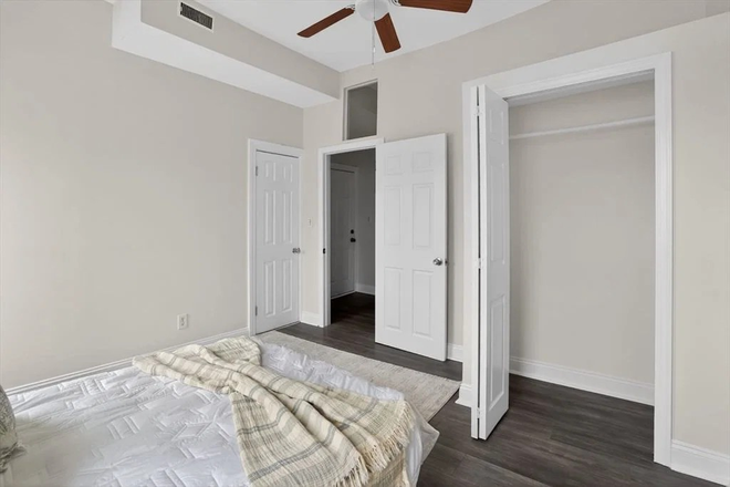 Large Bedroom - Ultra-commutable 7 Mins to MGH via Blue Line! Modern Furnished 2B w/ In-Unit Laundry - All Inclusive Condo