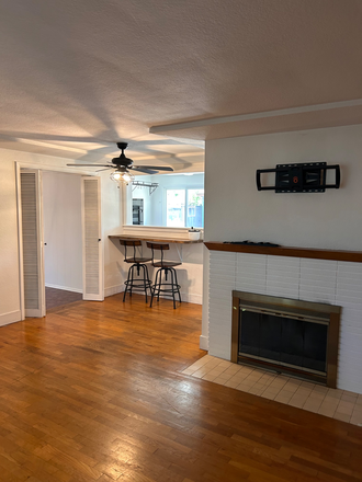 Living room into kitchen and bonus living room - Updated House close to campus