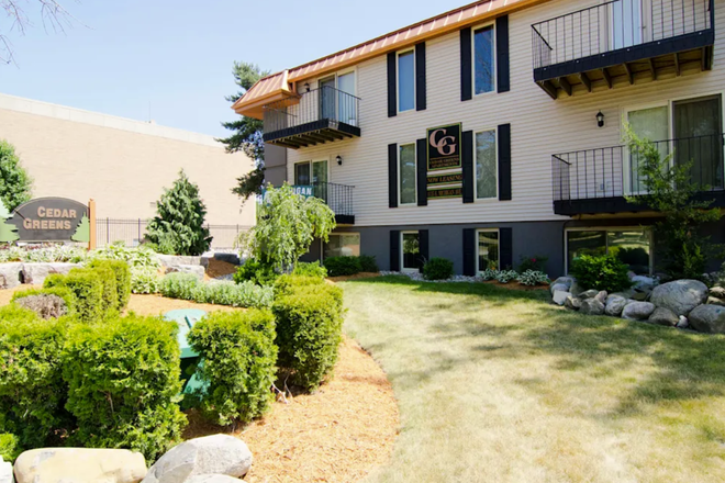 Outdoor view - Cedar Greens. Balcony in room. Right off campus! Shares a fence with Brody.