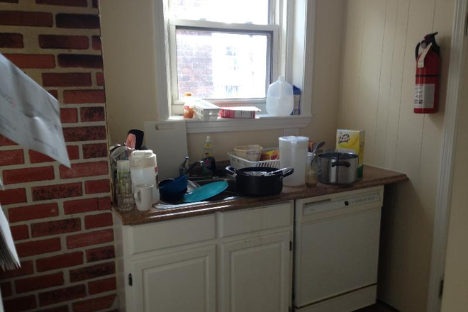 Visit hubrealtyproperties.com - Mission Hill, Spacious 4 bedroom with updated kitchen and porch, on T Apartments