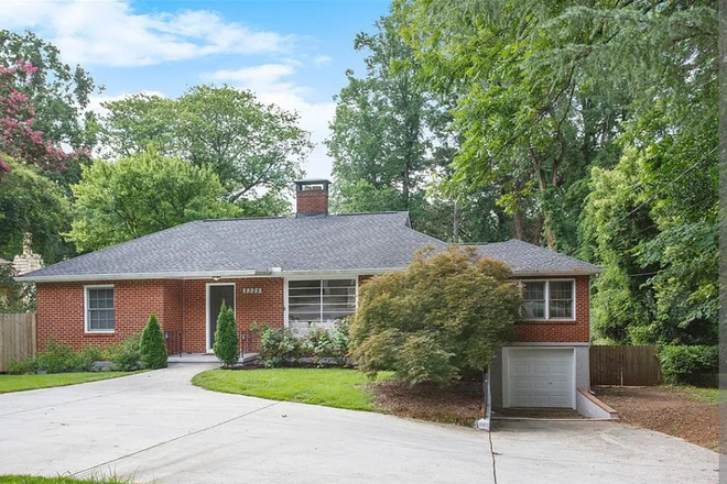 Exterior - Recently renovated house with a back deck and large backyard.