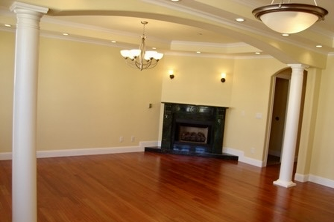 Living Room with Granite Fireplace & Roman Columns - Beautiful 3 BR/2.5 BA flat,1736 sqft, new construction, excellent location, MUST SEE! Apartments