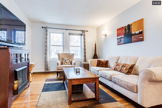 Living room - Beautiful 2BR 1BA with free off street parking and garage included Apartments