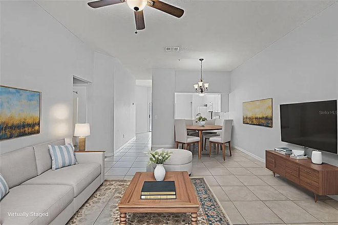 Living Room Area - AI Furnished - Furnished Room with Bathroom in a 2 br. Condo.  2 minutes from UCF Beginning January 2026