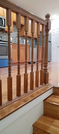 Stairs and Kitchen - Sunny Recently Renovated 2-Bedroom Second-Floor Apartment