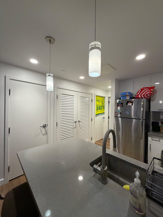 Kitchen + Coat Closet - 3-Bed On-Campus HBS Apartment (in unit washer/dryer)