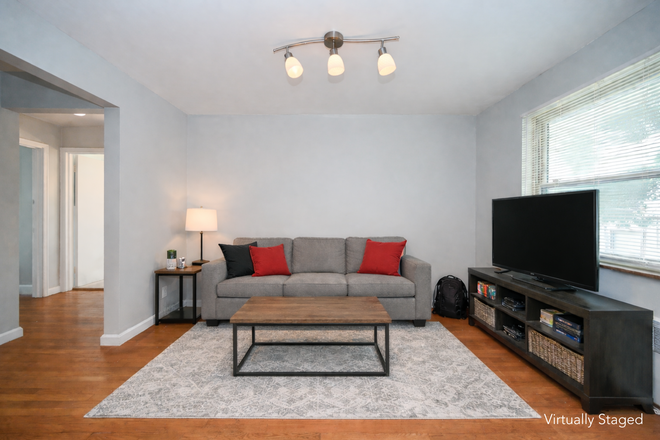 Living room - 203 Loraine Ave. Apartments