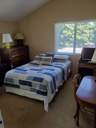 Bedroom looking from the entry to the window overlooking the backyard - Turtlerock Home - bike to UCI (Utilities, High Speed WiFi included)