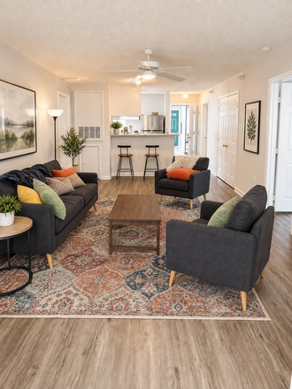 Living Room - All Girls Unit - Room with Private Bathroom at  University Woods at Centennial Condominiums