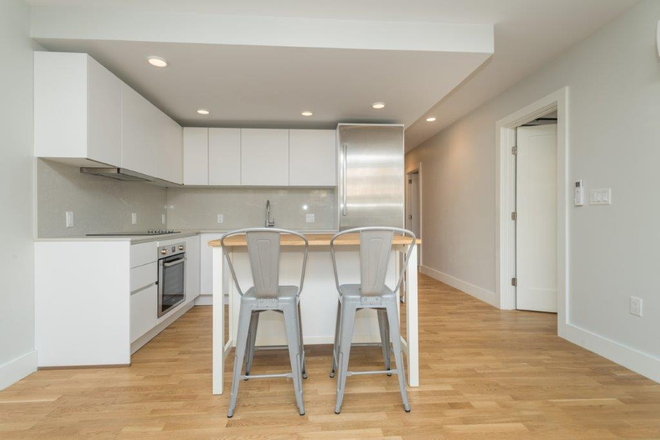 kitchen - *NO BROKERS FEE!* Renovated 3 Bed/2 Bath w/ LAUNDRY IN UNIT! Avail. 9/1/26! Apartments