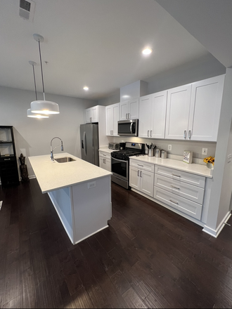 Kitchen - Urban Oasis Hideaway Apartments