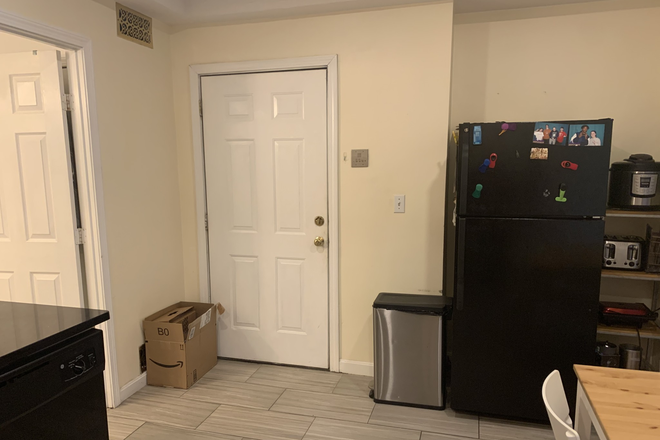 Kitchen area - Gorgeous 3 bed 1 bath apartment with quartz countertops and laundry in building.