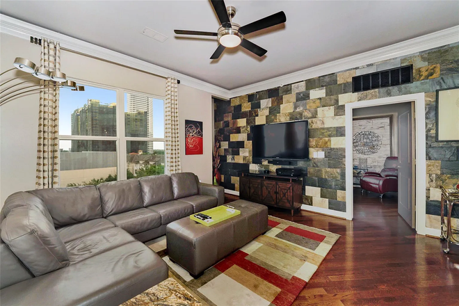 Living Room - Furnished, flexible lease in Montrose/River Oaks - female roommate! Apartments