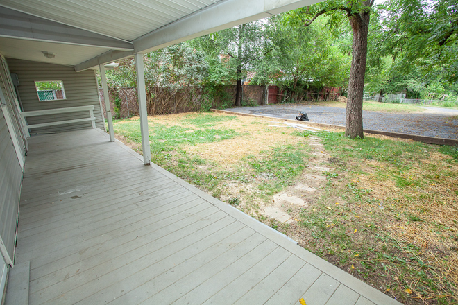 back yard and parking lot - 230 Chicago Ave, Harrisonburg, VA- Spacious Downtown Duplex with Charm and Character! Duplex