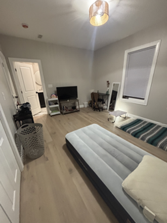 Primary Bedroom (room 2) - Female: 2/4 rooms available $900/mo sunroom and $1,300/mo primary bedroom w/ privatebathroom