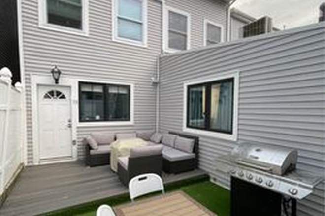 Patio/Deck - Looking for roommate - East Boston Townhouse, 2-bed/2-bath