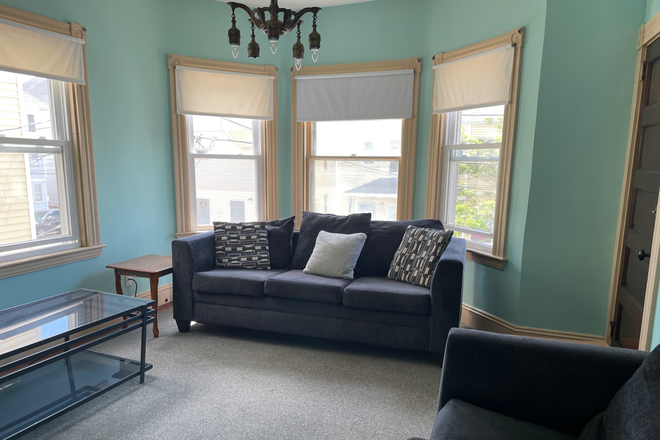 Living room - 3 Bedroom 2nd Floor $950 Apartments