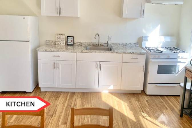 Kitchen - All Utilities! WIFI and Parking Included! Clean and quiet 3BR/2BA apartment!