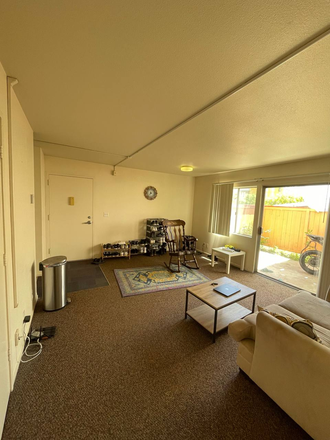 Living Room View 1 - Close to Campus Apartments