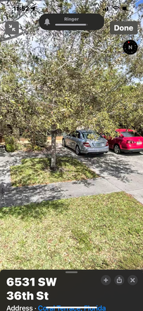Front and driveway view - Private patio, close to campus