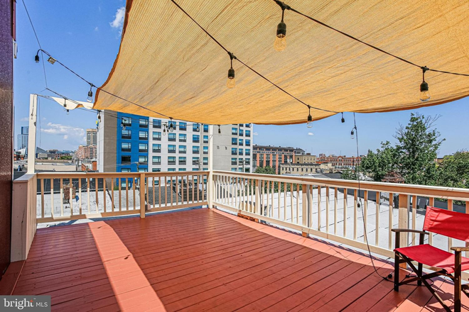 Rooftop - Experience sophisticated city living in this beautifully updated colonial Townhome