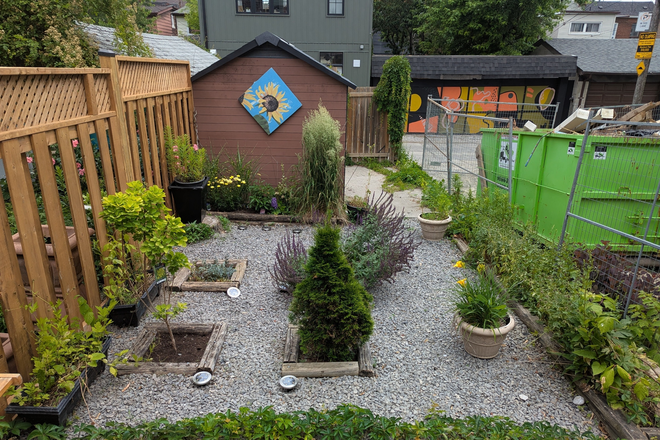 Backyard porch - Furnished Basement Studio Apartment with laundry