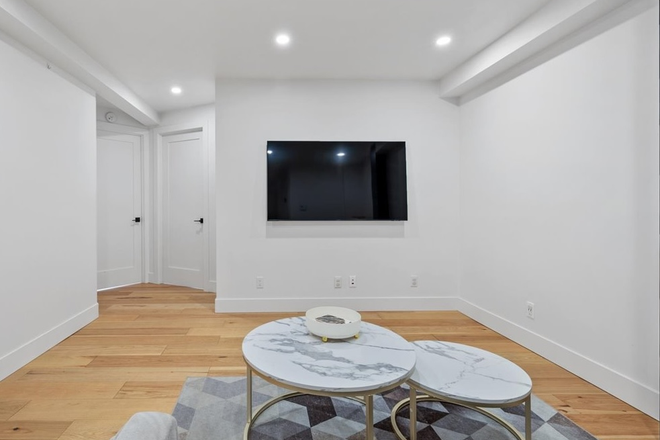 Living Room - Private Room in Luxury Downtown Stamford Condo - Just a 5-Minute Walk to UConn!