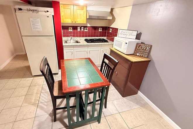 Kitchen/Breakfast island - UPDATED 3-19-25 Renovated Basement/Bedrooms in Quiet Home (2 bedrooms available)