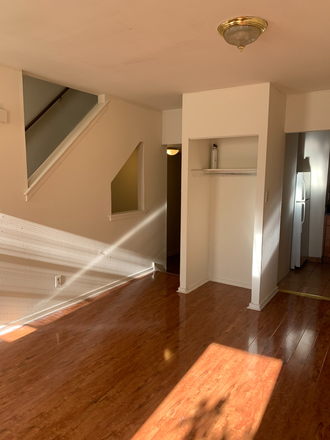 Unit 2 living room - 2-3 Bedroom Apartments Near Temple University